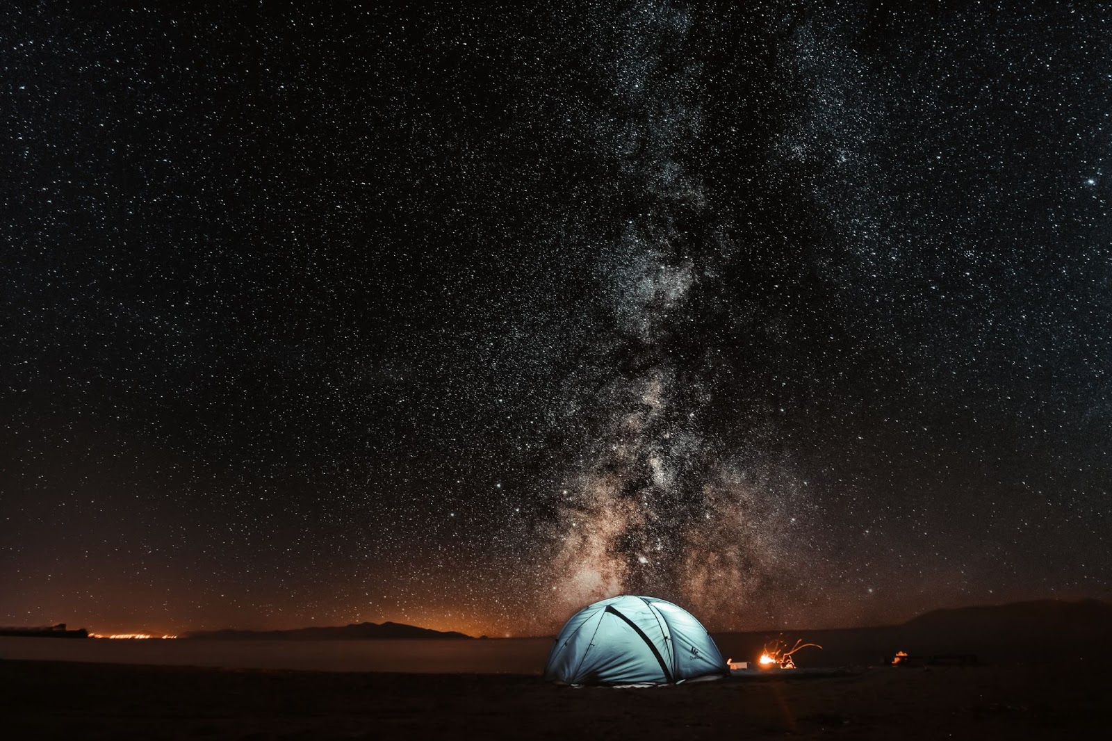 starry night sky and tent